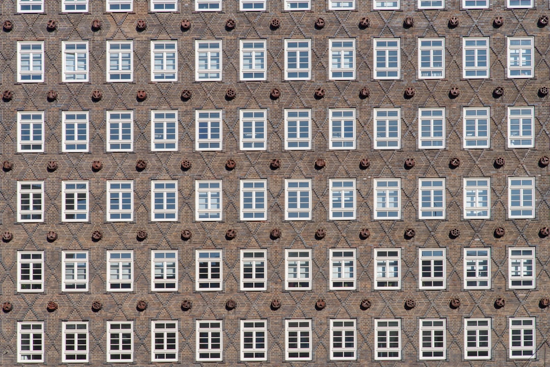 Rows of identical windows on a building facade