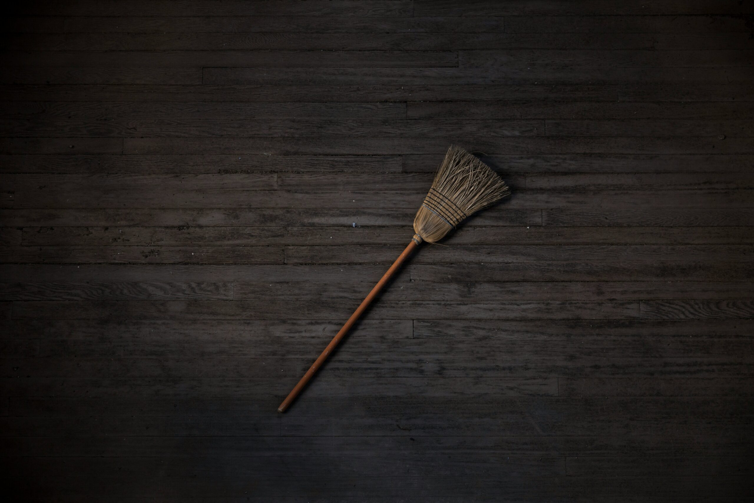 Brown and black brush on brown wooden table