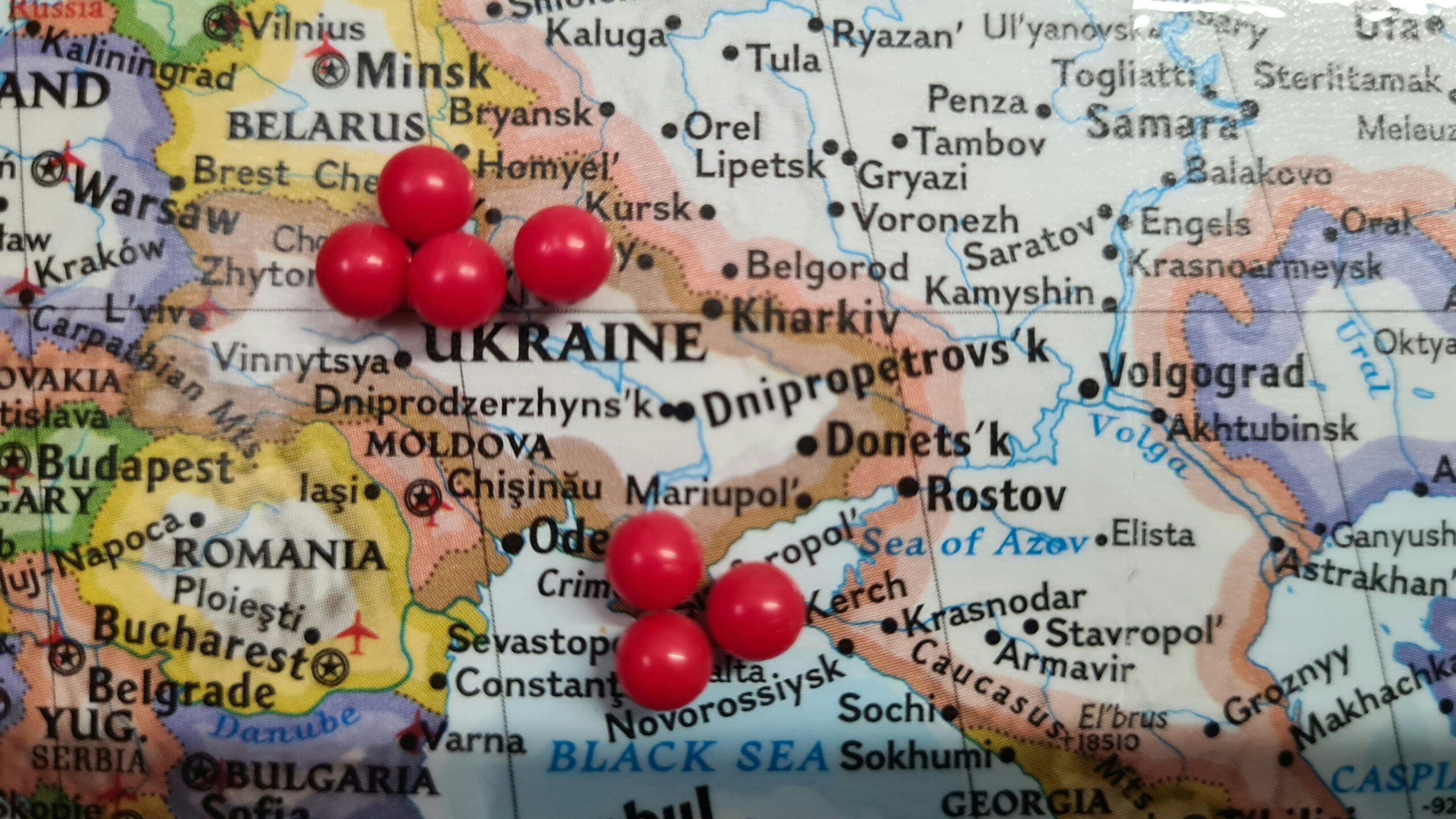 A map with a bunch of red balls on it
