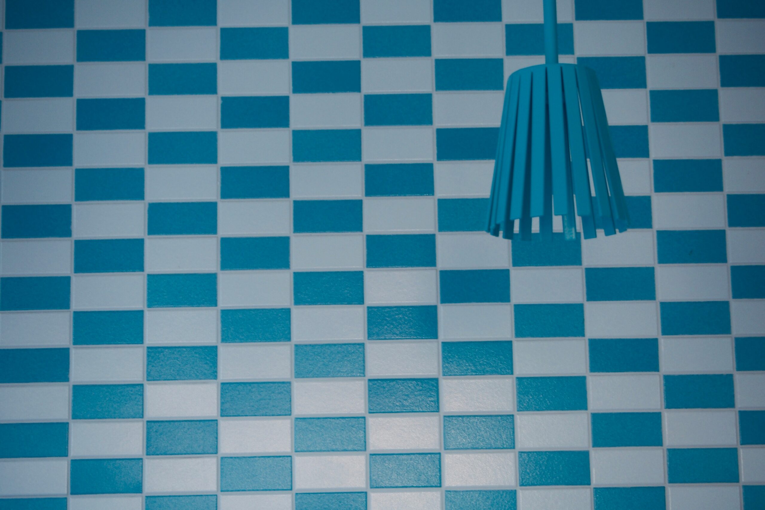 White and teal checkered ceramic tiles